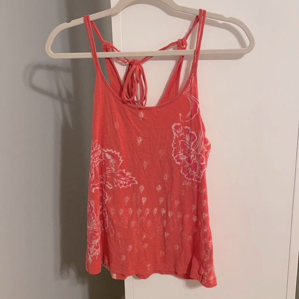 Peach tank top with flower designs